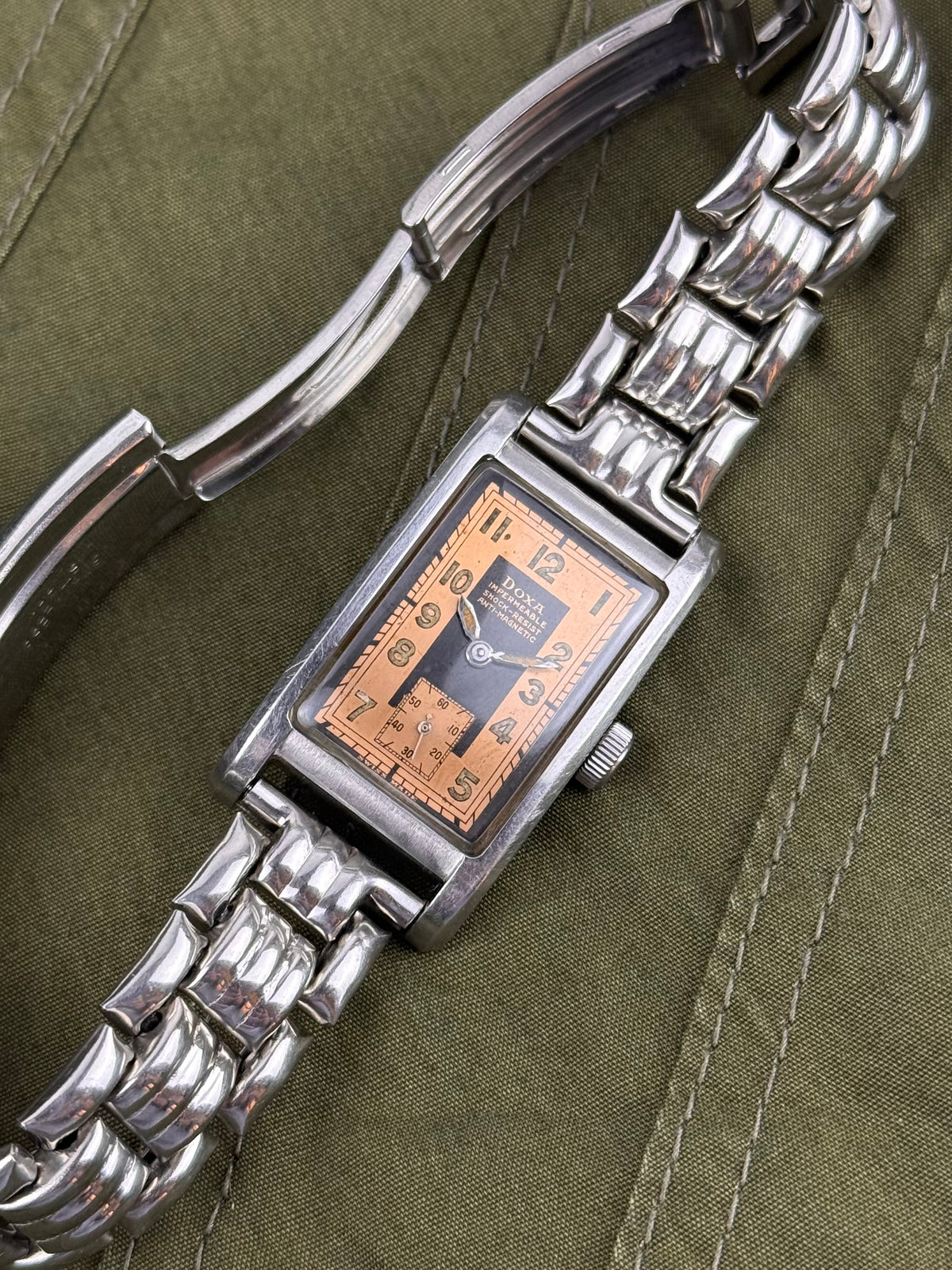 1940s Doxa Clamshell Copper Tuxedo Dial