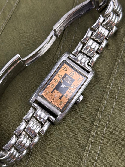 1940s Doxa Clamshell Copper Tuxedo Dial