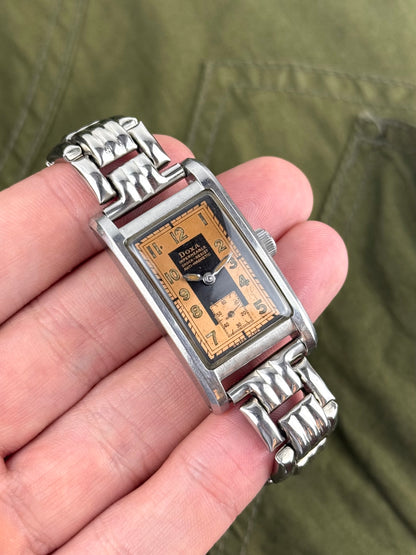 1940s Doxa Clamshell Copper Tuxedo Dial