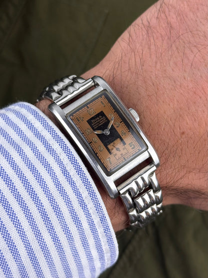 1940s Doxa Clamshell Copper Tuxedo Dial