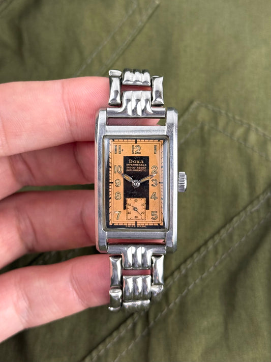 1940s Doxa Clamshell Copper Tuxedo Dial