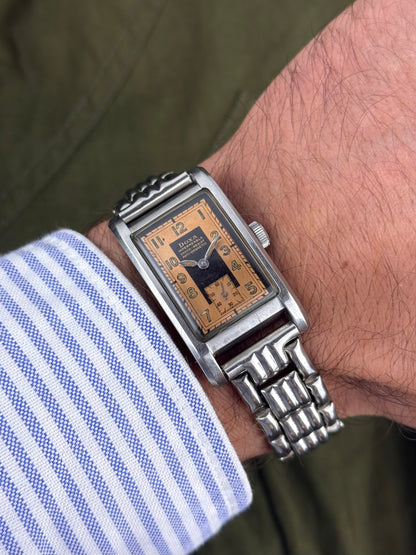 1940s Doxa Clamshell Copper Tuxedo Dial